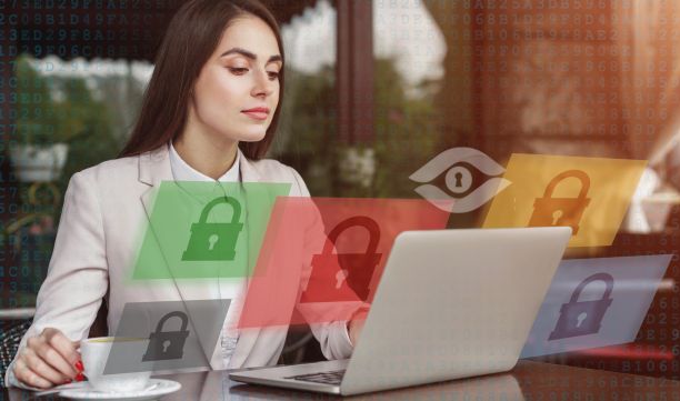 The woman at the desk on a laptop is making sure her company stays compliant with CMMC 2.0. Photo of woman on laptop with photos of padlocks and the MathCraft icon